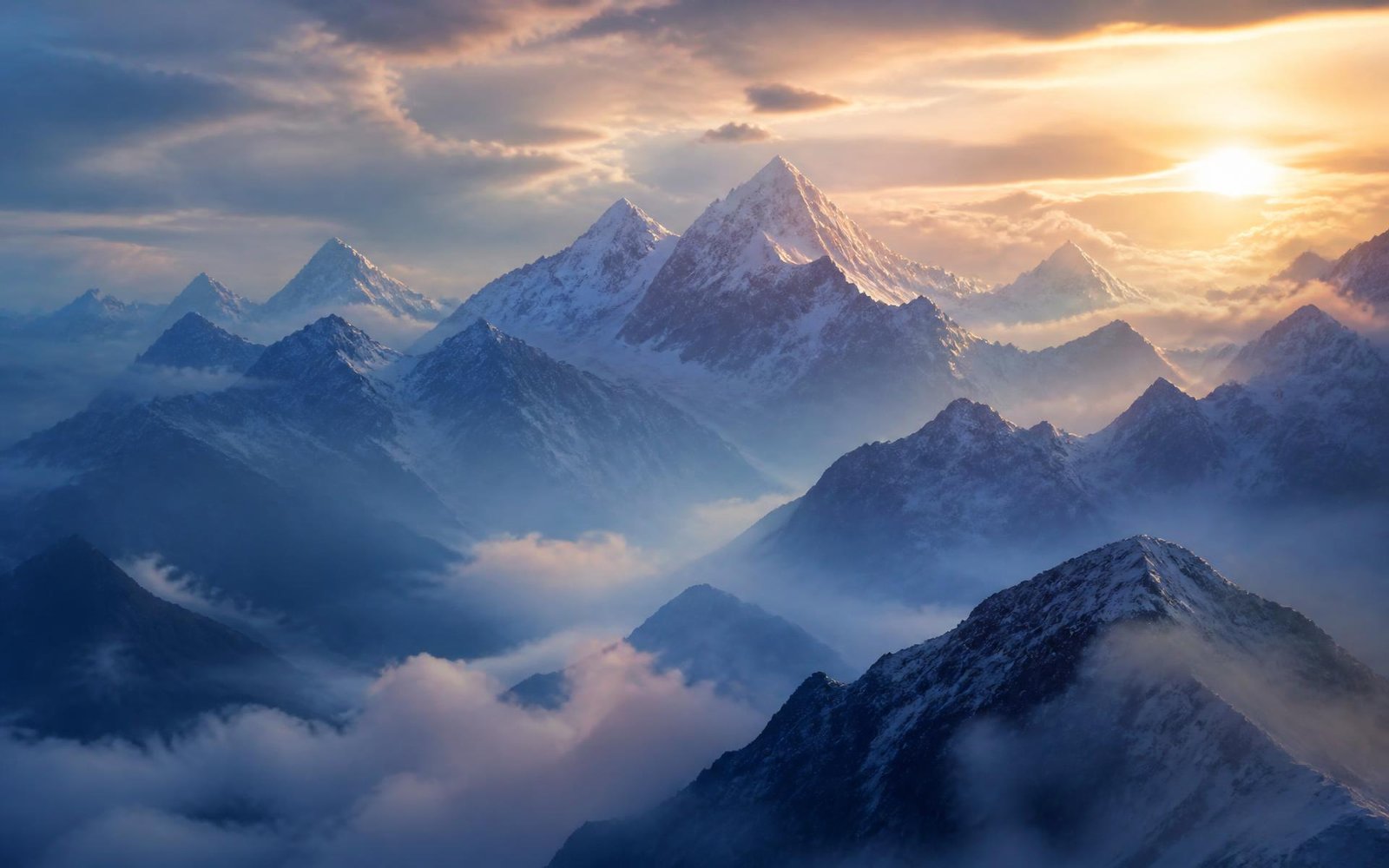Misty Himalayan peaks at dawn